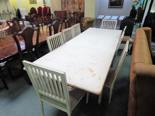 A Long Rectangular Dining Table Image