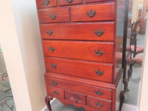 A Wooden Chest with Multiple Cupboards Image