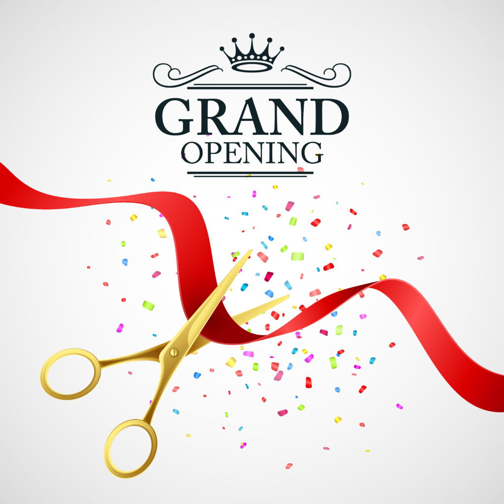 ribbon cutting for a grand opening poster