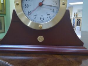 A Mantle Clock in Stock on the Table Image