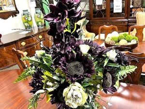 floral arrangement in black vase