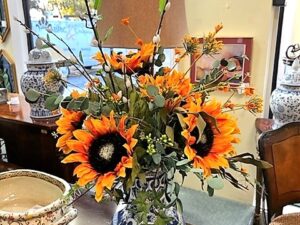 floral arrangement on blue and white vase