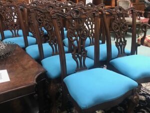 Chairs in a Row with Blue Cushions Image