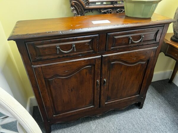 A Wooden Furniture with Cupboards Image